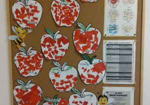 13 prac dzieci - wycięte z papieru i ozdobione bibułą jabłka