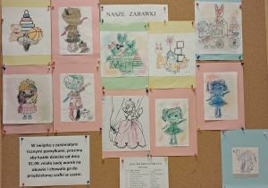 Tablica z pracami dzieci. Kolorowanki pt. "Nasze zabawki".